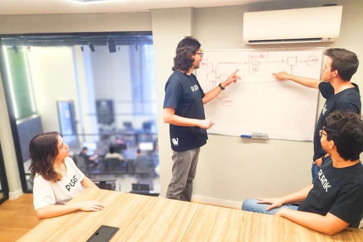 A Plank engineer leading a technical session